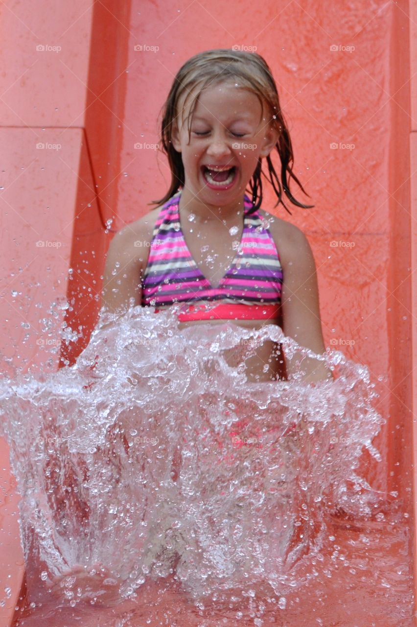 Girl enjoying water slide !