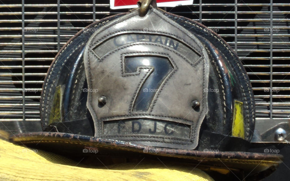Firefighter Helmet. Jersey City, NJ Firefighter helmet on firetruck