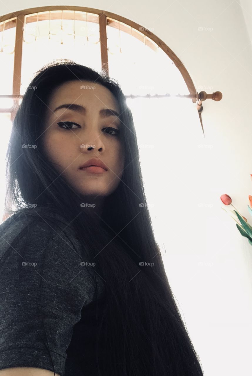 Me myself in the look of black long hair and black shirt in Sunday morning, Thailand