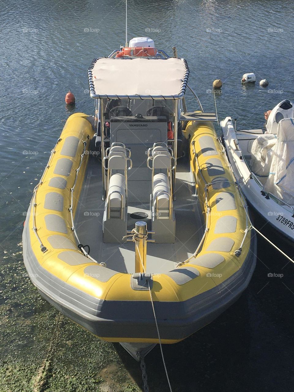 Grey and yellow boat