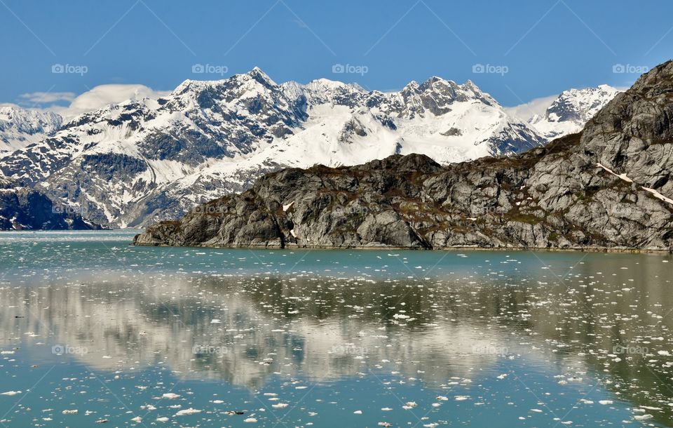 Alaska range reflected on frozen lake