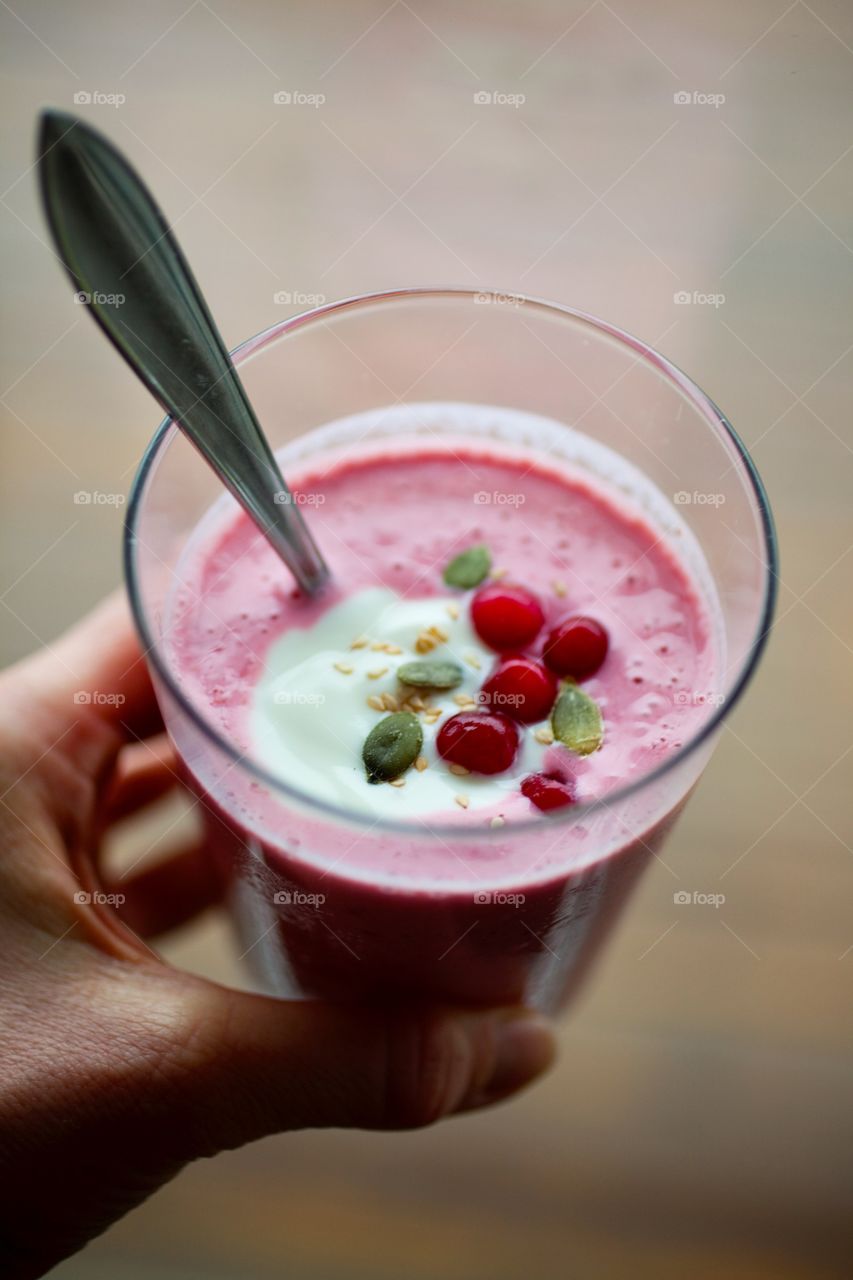 Strawberry smoothie in glass outdoors