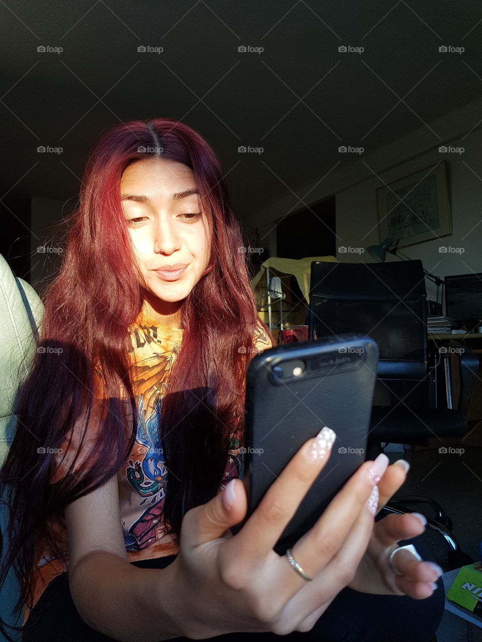 Teen girl is taking a selfie